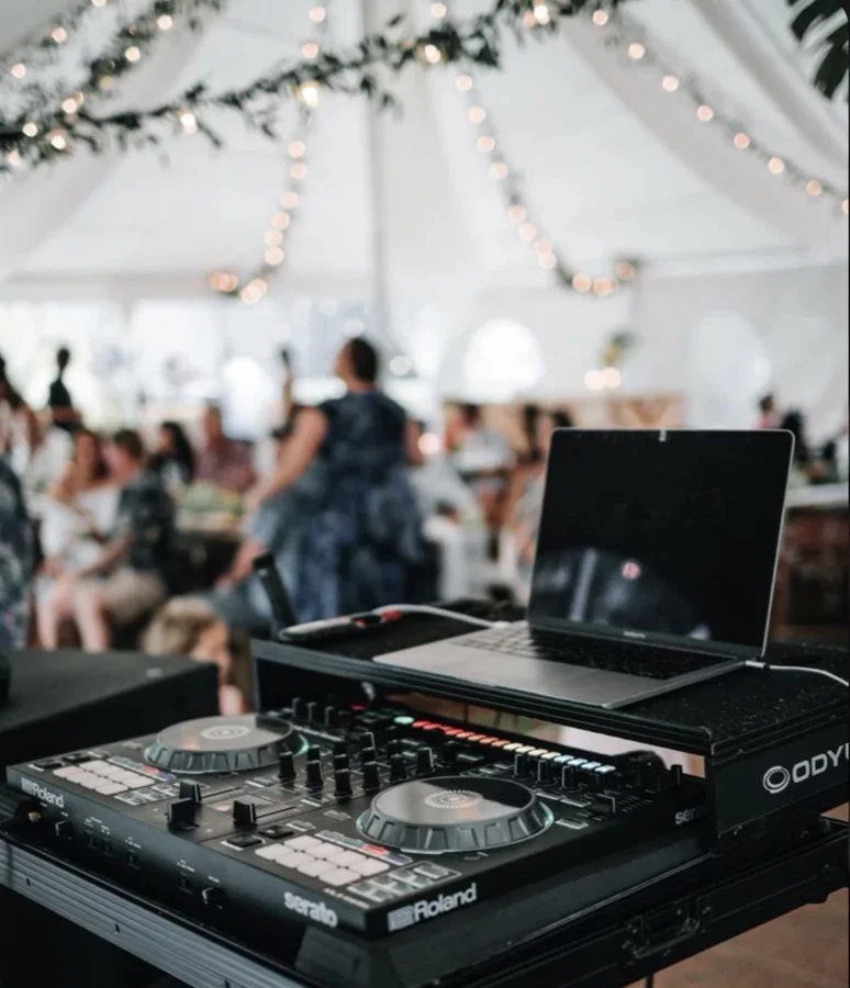 Wedding DJ booth dressed for a reception